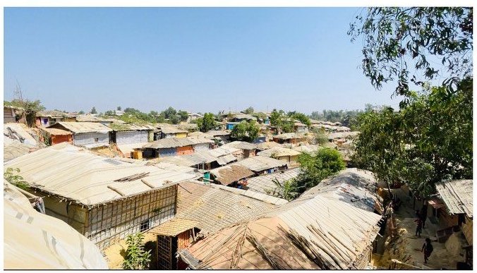 Refugee camp roofs covering the hills