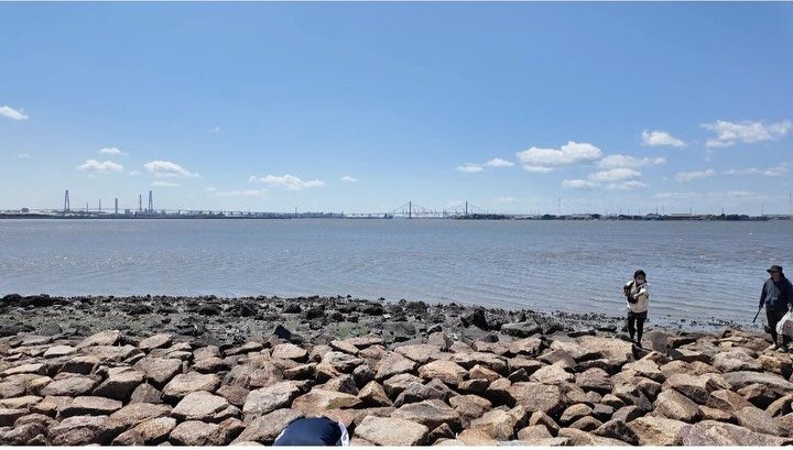 The Fujimae Tidal Flat embankment under a blue sky