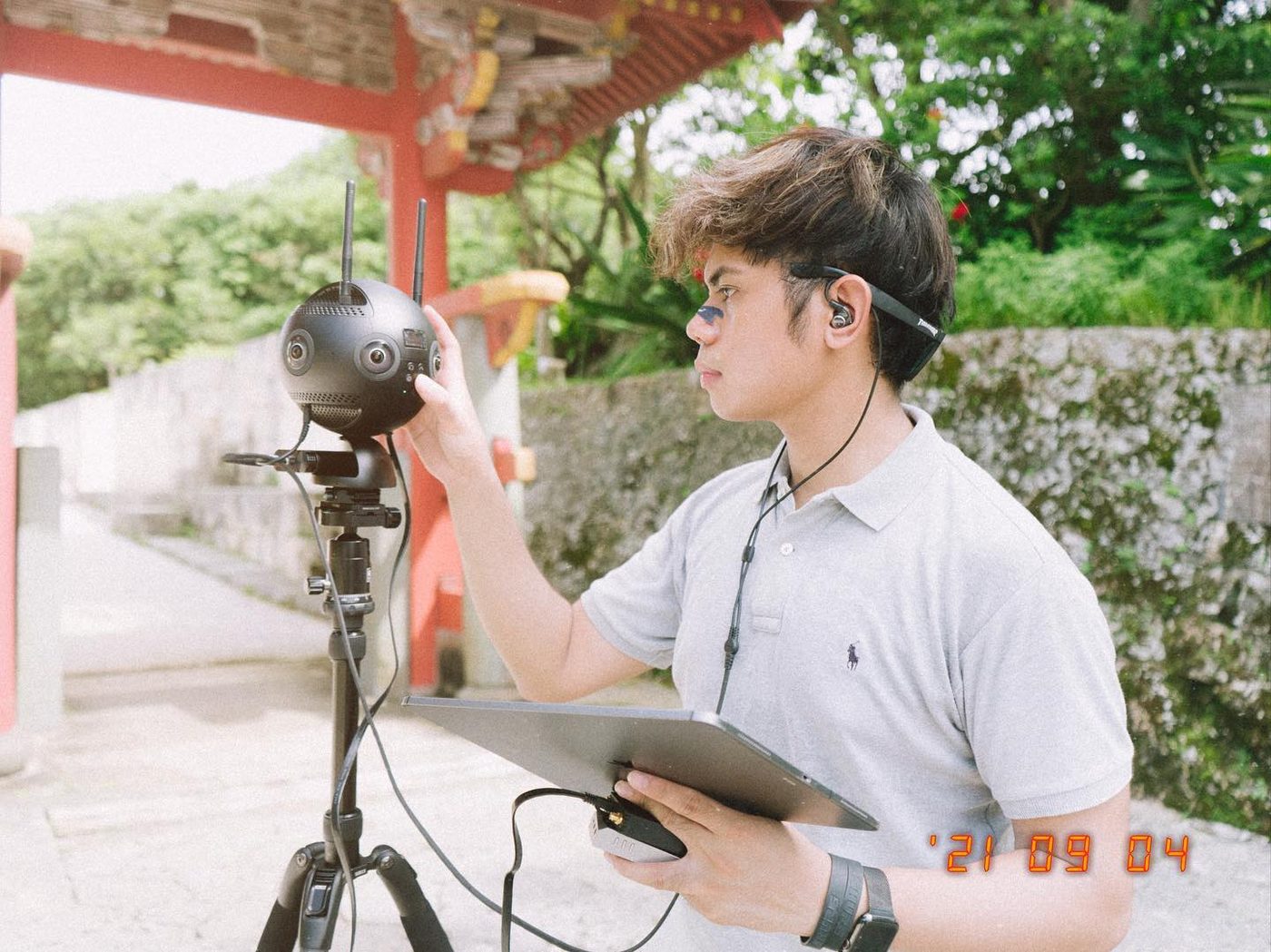 Narita Jun adjusting a VR camera
