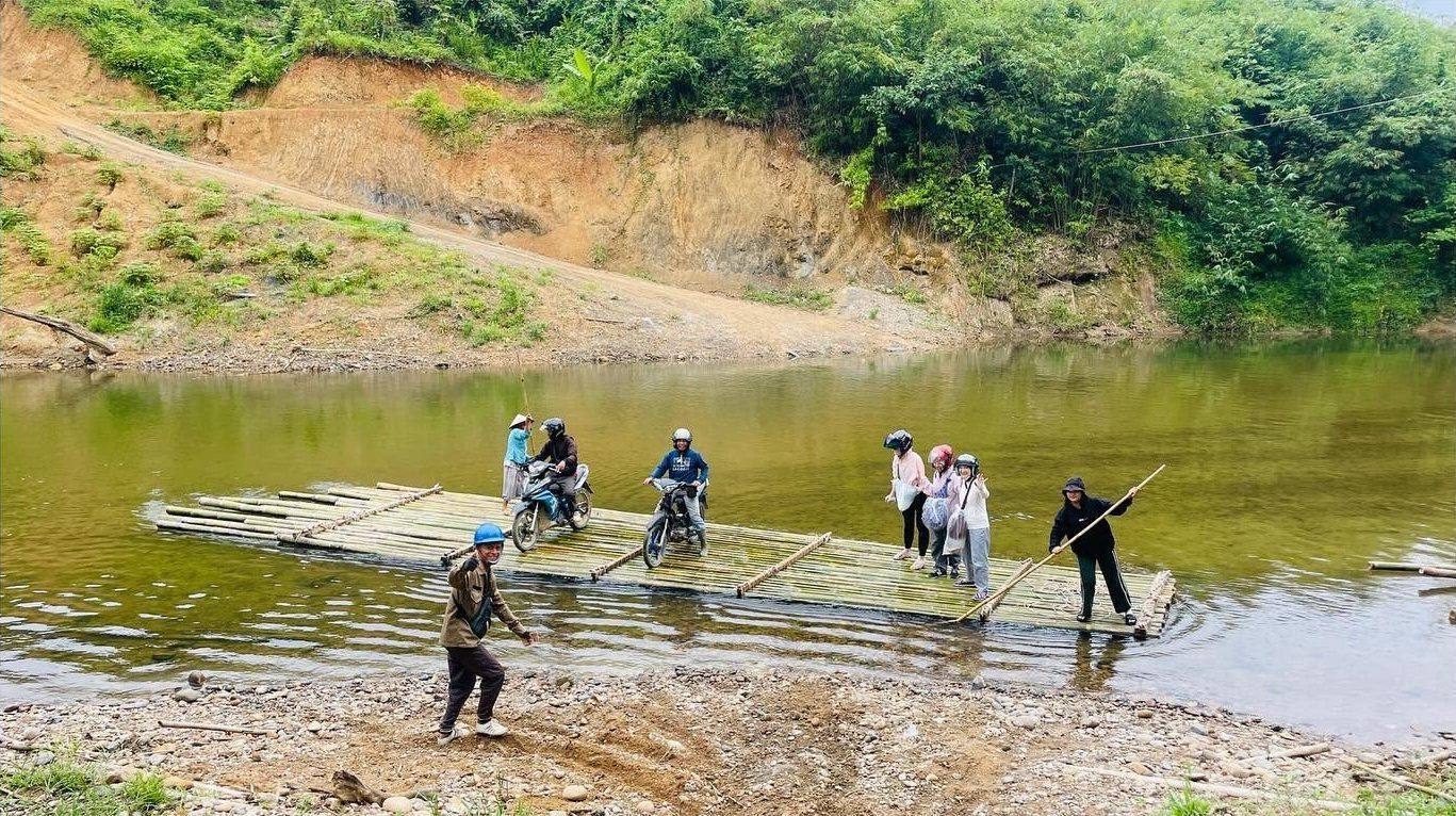 Crossing the river to the village