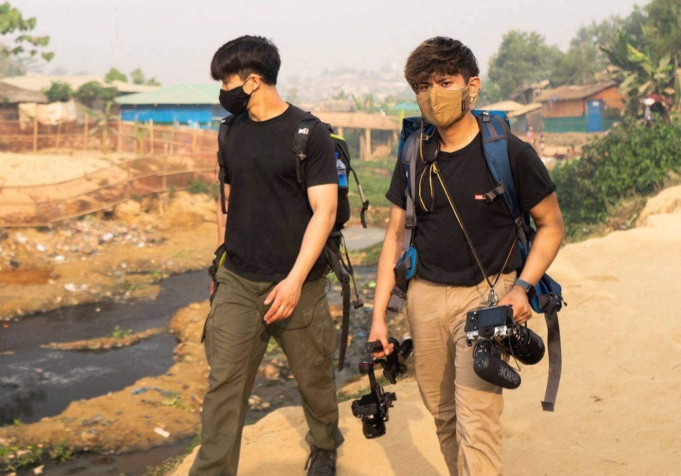 Walking through the camp to report