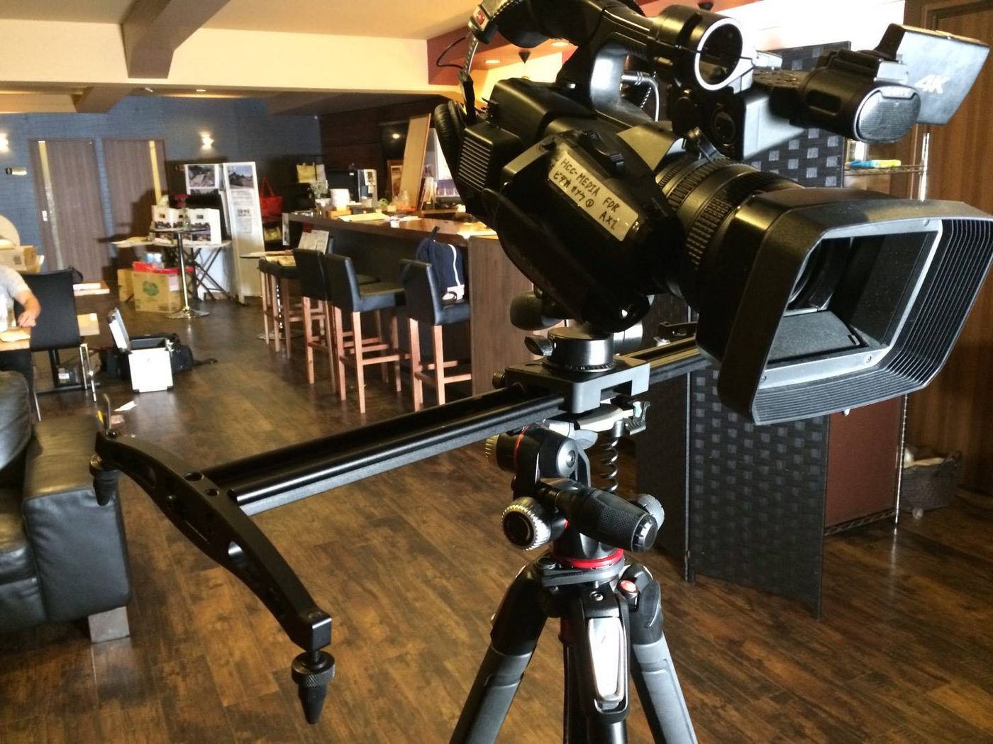 A professional video camera on a slider